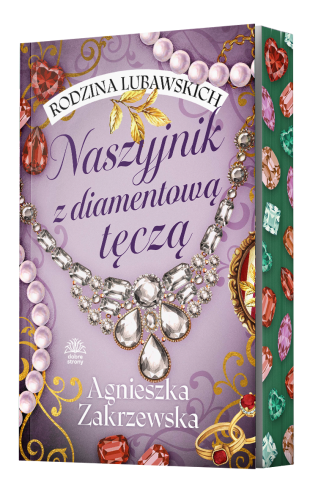 Fioletowa okładka z dużym, misternie zdobionym naszyjnikiem z diamentów i kolorowych kamieni, tworzących efekt tęczy. U góry widnieje nazwa serii Rodzina Lubawskich, a na dole nazwisko autorki, Agnieszki Zakrzewskiej.